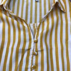 Women’s sleeveless stripe blouse, tied bottom.